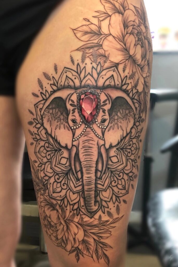 Mandala elephant thigh tattoo