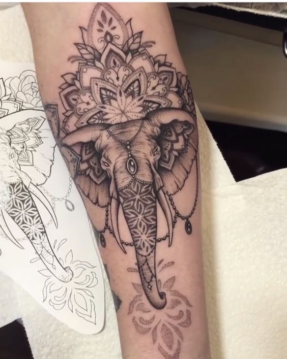 best Mandala elephant tattoo with flowers
