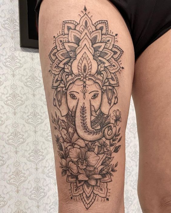 fine Mandala elephant tattoo with flowers design
