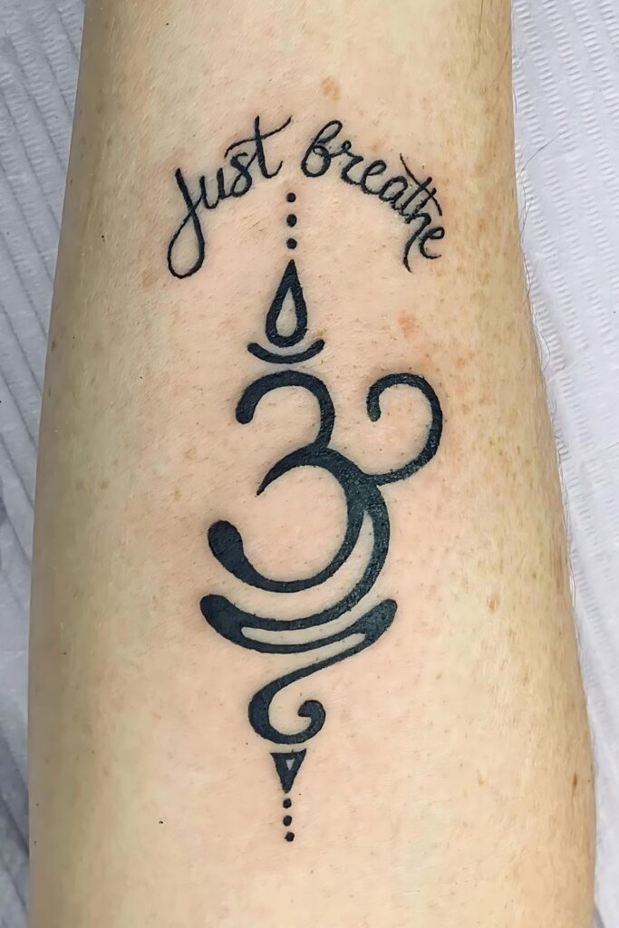 Just-Breathe-and-om-Symbol-Tattoo-on-hand-for-Men